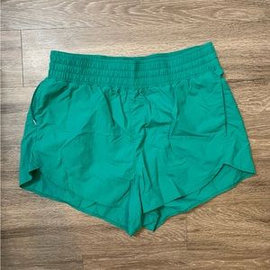 all in motion women’s crinkle run tulip shorts - green